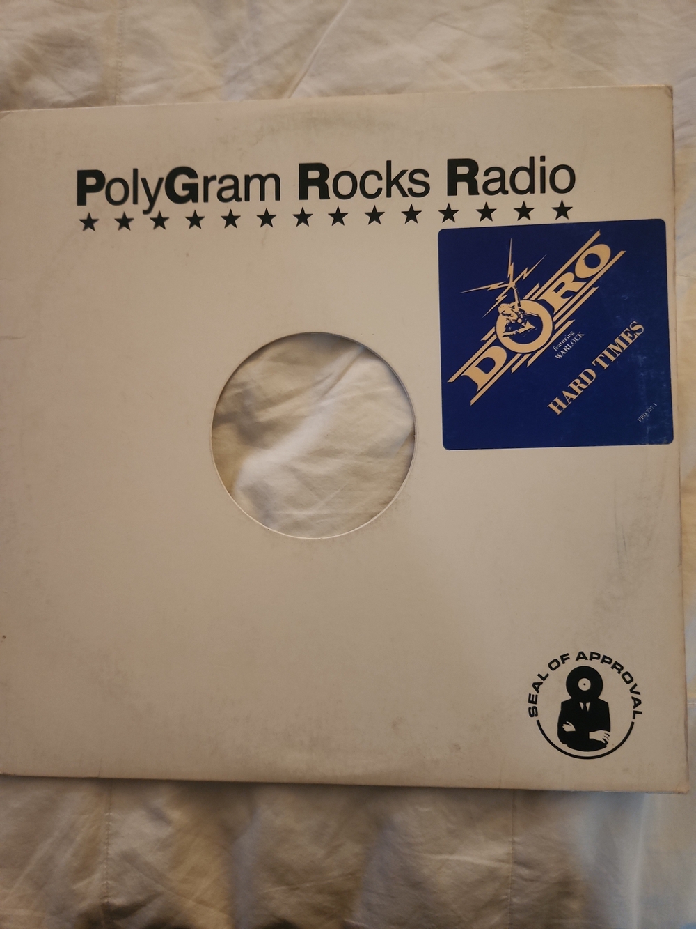 Rocks Radio White Vinyl Record Sleeve with Blue Dor-O Sticker